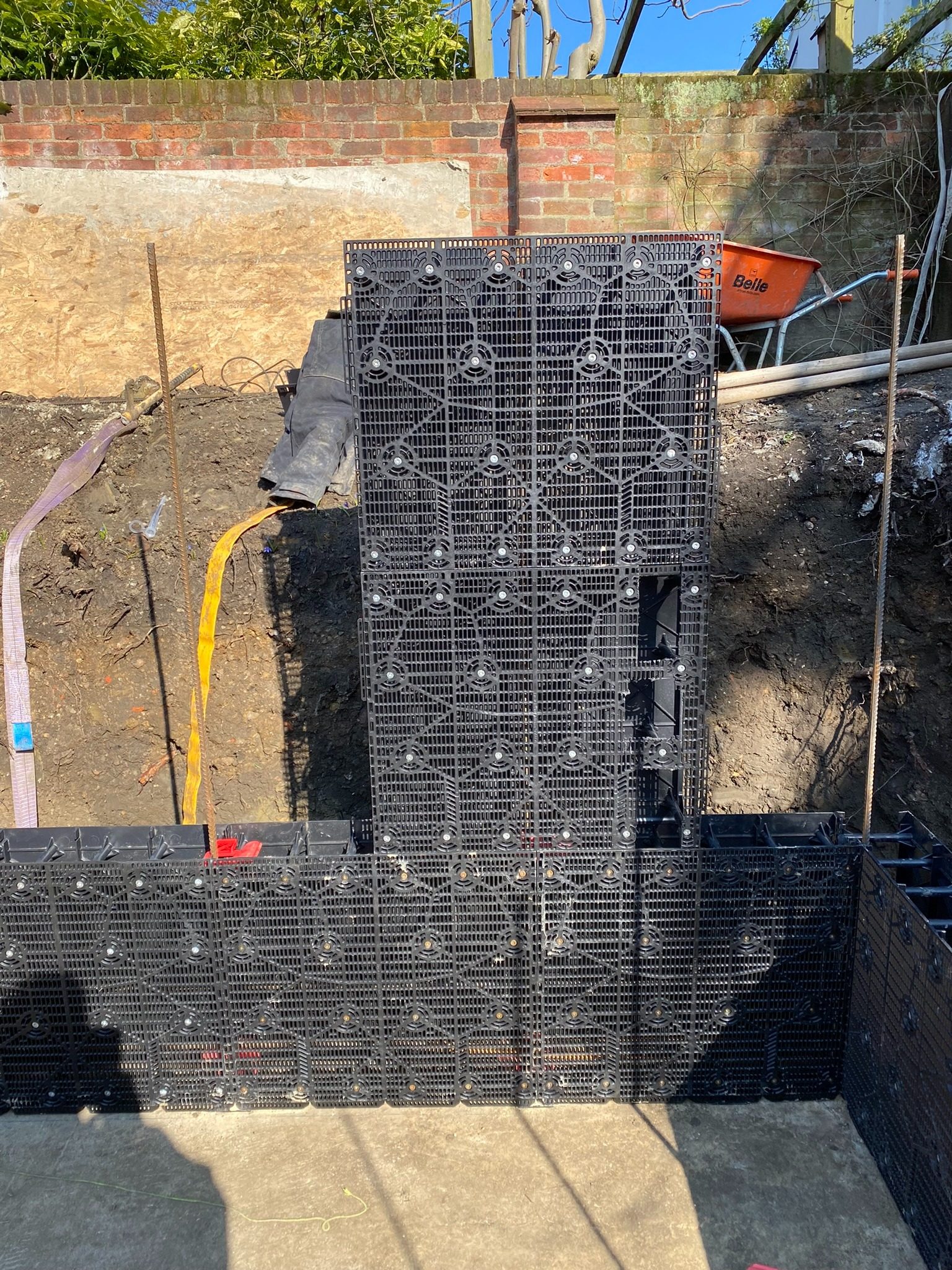 Long swimming pool shell under construction